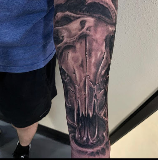 Explore family tree sleeve tattoo ideas, creative tattoo ideas in Odessa, available at Black Cat Tattoo Company