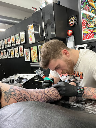 Explore barbie tattoo ideas, creative tattoo ideas in Eau Claire, available at Gold Snake Tattoo