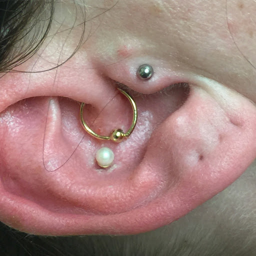 Explore lower back cover up tattoo ideas, creative tattoo ideas in San Diego, available at Body Art Salon