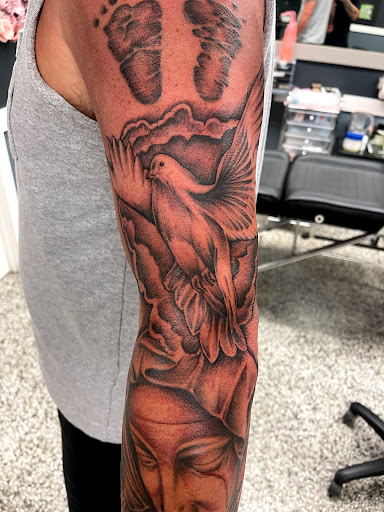 Explore tattoo cross ideas for men, creative tattoo ideas in Sanford, available at Luv Ink