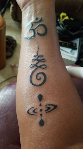 Explore tattoo ideas flames, creative tattoo ideas in Hampton, available at Blue Horseshoe Tattoo and Body Piercing