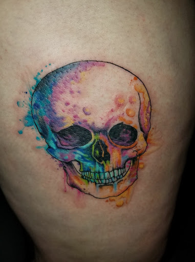 Explore hair stylist tattoo ideas, creative tattoo ideas in Athens, available at United Ink Tattoos and Body Piercings