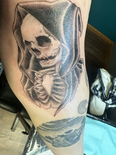 Explore matching tattoo ideas for brothers, creative tattoo ideas in Bay City, available at Electric Chair Tattoo