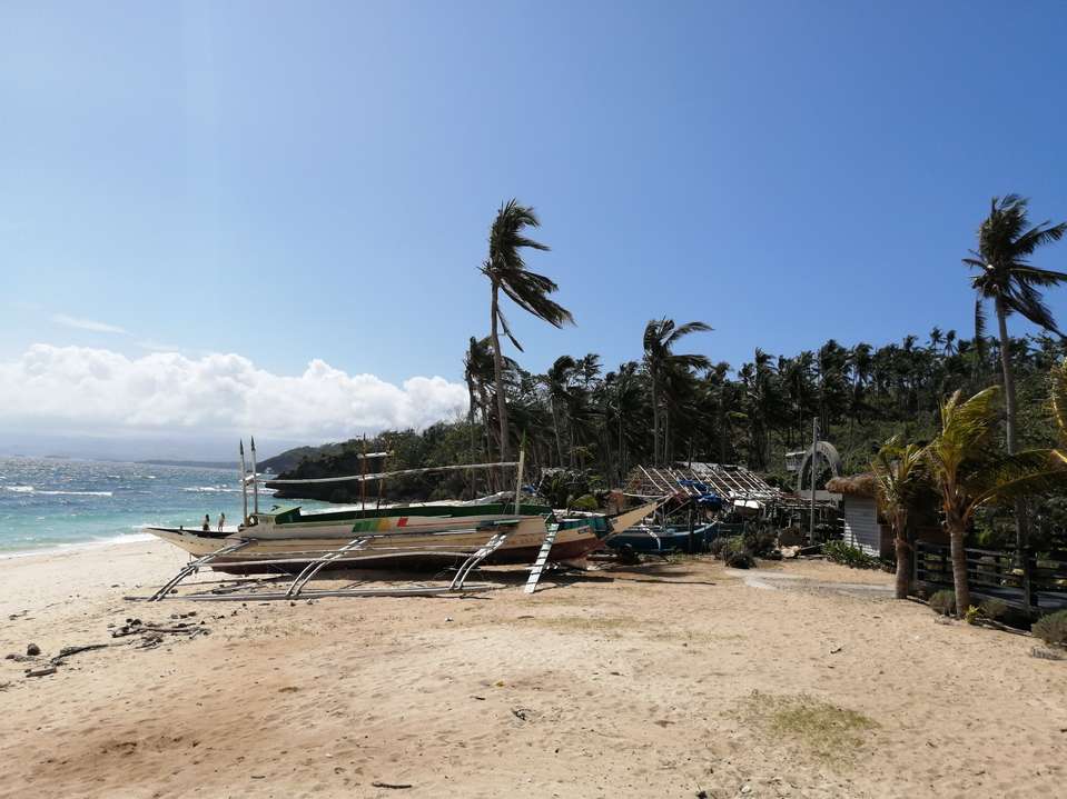 Photo de Iligan Beach II avec l'eau cristalline de surface