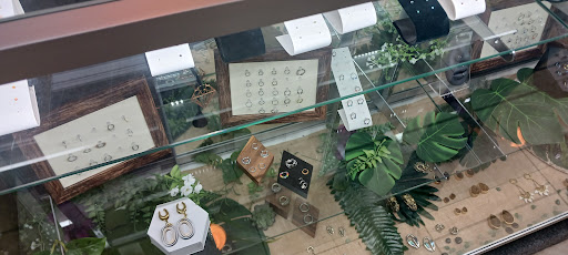 Explore be still and know tattoo ideas, creative tattoo ideas in Riverside, available at Laughing Buddha Body Piercing