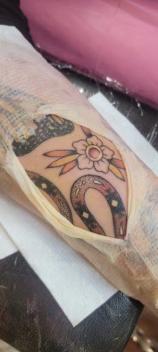 Explore feminine leg tattoo ideas, creative tattoo ideas in Carbondale, available at Bonedale Tattoo
