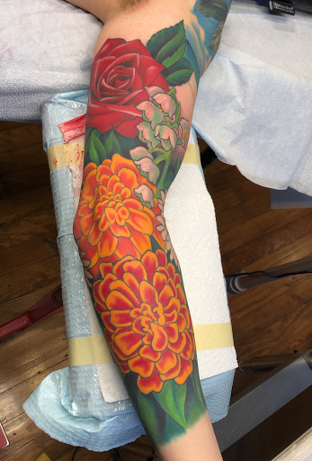 Explore dainty hand tattoo ideas, creative tattoo ideas in Buffalo, available at The Tilted Rose Tattoo