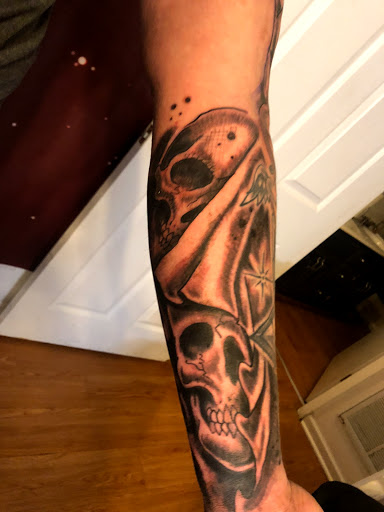 Explore back shoulder tattoo ideas for men, creative tattoo ideas in Madison, available at ART IMMORTAL TATTOO