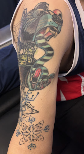 Explore chin tattoo ideas, creative tattoo ideas in Sunbury, available at Spot of Ink