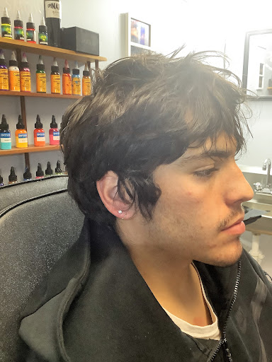 Explore boy mom tattoo ideas, creative tattoo ideas in Whitehall, available at Beachside Tattoos & Smoke Shop