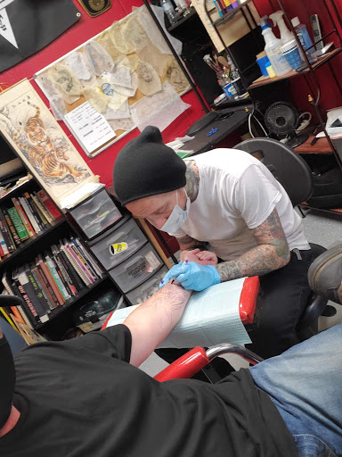 Find tattoo ideas western for your next unique tattoo in League City at Zen Body Art & Adornment Tattoo Shop