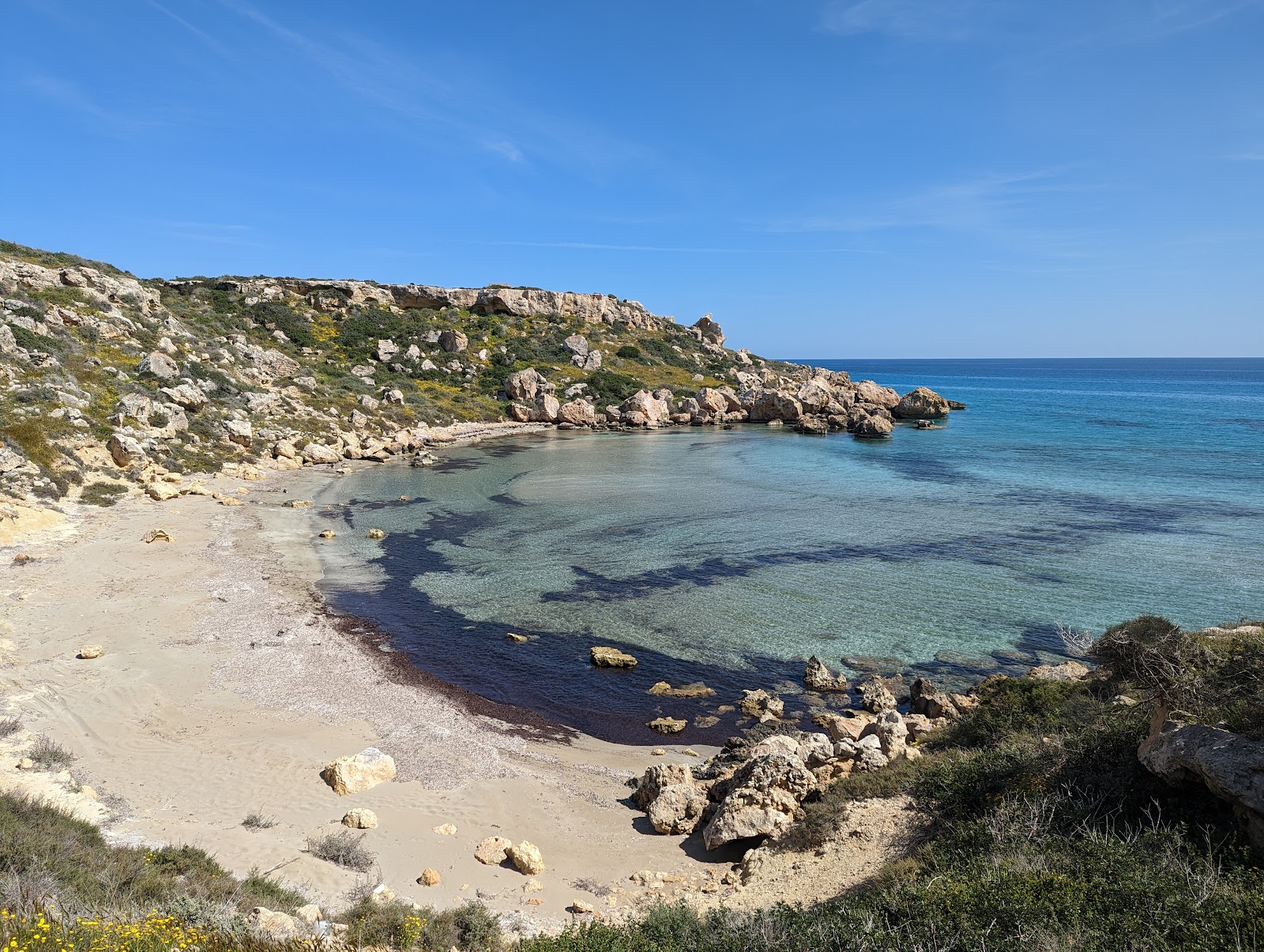 Foto van The Quiet Place Beach met beige zand oppervlakte