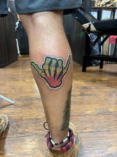 Explore mens thumb tattoo ideas, creative tattoo ideas in Orlando, available at Good Vibrations Ink Tattoo and Body Piercing