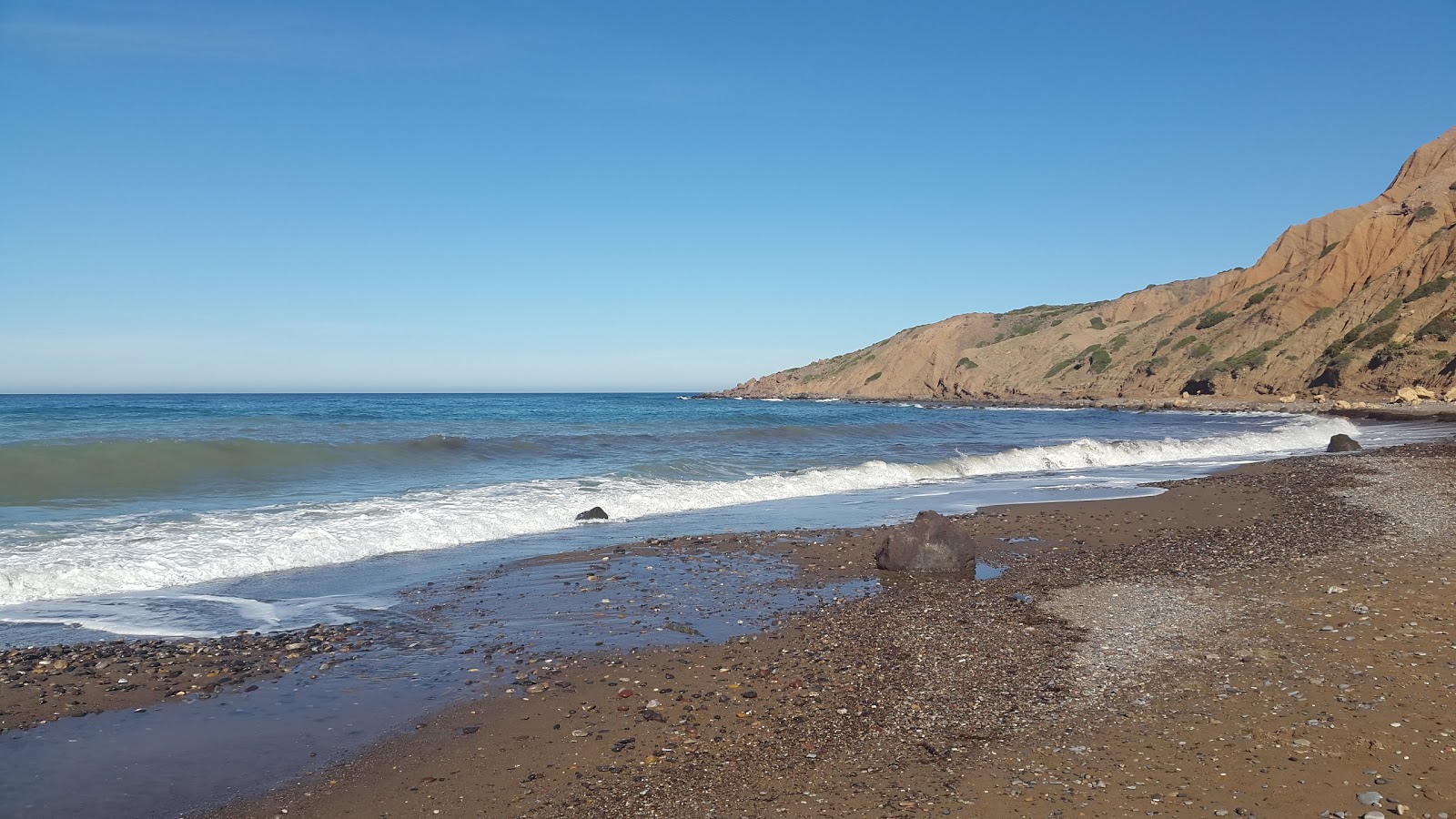 Photo de Malous Plage situé dans une zone naturelle
