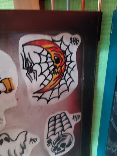 Explore sideburn tattoo ideas, creative tattoo ideas in Madisonville, available at Mainstream Body Art