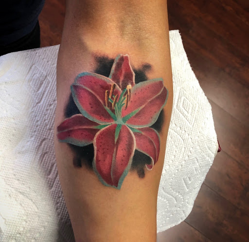 Explore rock n roll tattoo ideas, creative tattoo ideas in Modesto, available at Inkwell Tattoo