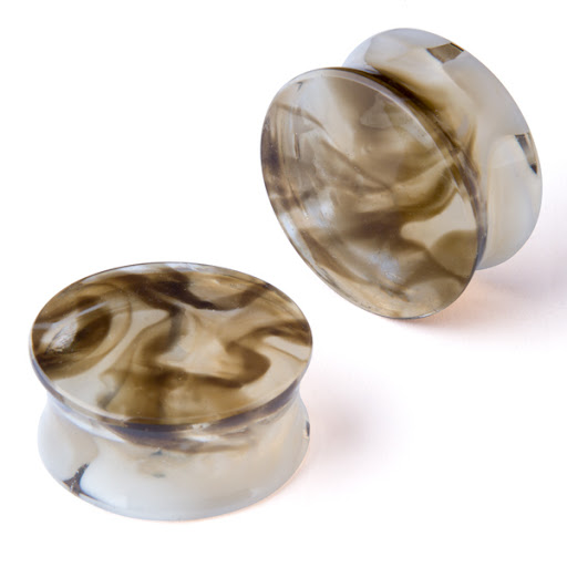 Find between breast tattoo ideas for your next unique tattoo in Riverside at Laughing Buddha Body Piercing