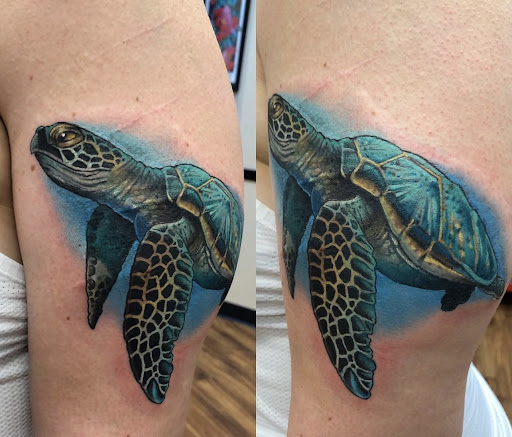 Explore globe tattoo ideas, creative tattoo ideas in Honolulu, available at Aloha Tattoo Waikiki Hilton Hawaiian Village Rainbow Bazaar