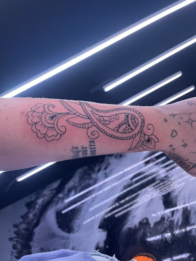 Explore womens thigh tattoo ideas, creative tattoo ideas in Stuart, available at Kenny Tats Inkcorporated