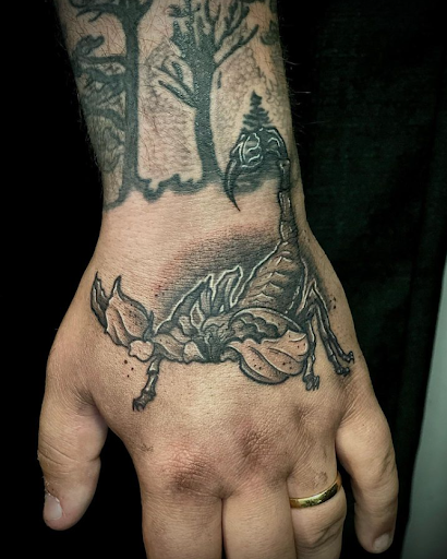 Explore lat long tattoo ideas, creative tattoo ideas in Columbus, available at Infamous Ink Tattoos and Piercings