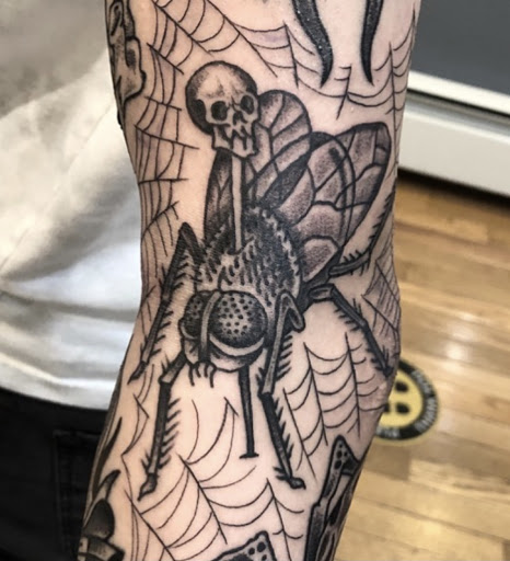 Explore family tree tattoo idea, creative tattoo ideas in Brooklyn, available at Hand of Glory Tattoo & Piercing