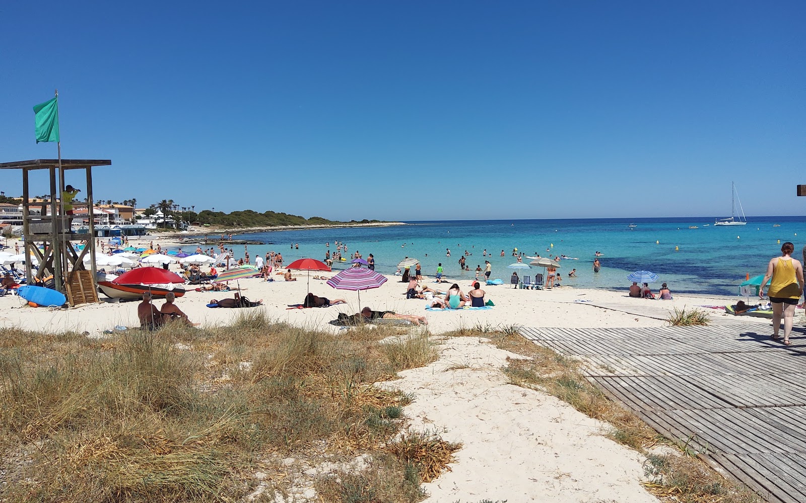 Foto av Punta Prima Beach med hög nivå av renlighet