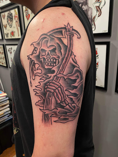 Explore tattoo ideas for rip brother, creative tattoo ideas in Omaha, available at Liquid Courage Tattoos