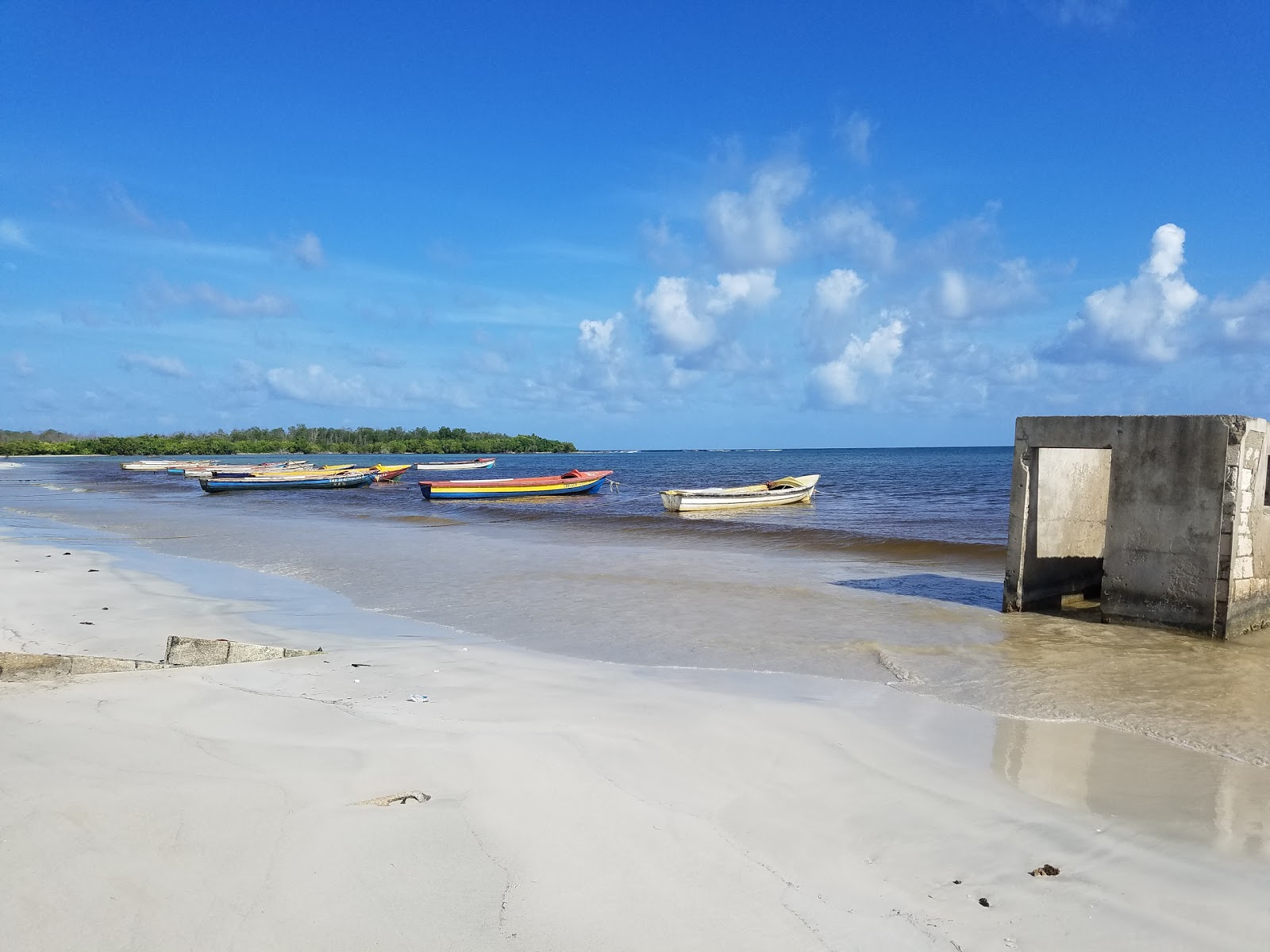 Foto van Rocky Point beach met turquoise puur water oppervlakte