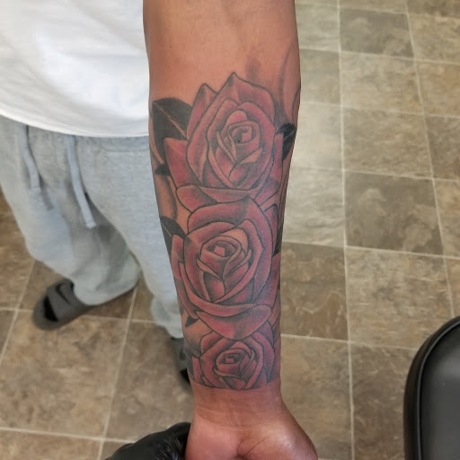 Explore mens forearm sleeve tattoo ideas, creative tattoo ideas in Albany, available at Tat Jones Ruthless Tattoos L.L.C.