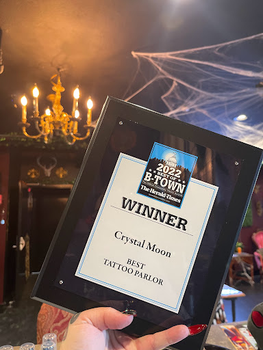 Explore sticker sleeve tattoo ideas, creative tattoo ideas in Bloomington, available at Crystal Moon Body Arts