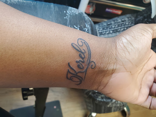 Tattoo Shop «The Iron Inkwell Custom Tattoos & Piercings», reviews and photos, 1901 N Monroe St Suite D, Tallahassee, FL 32303, USA