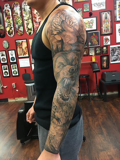 Explore armband tattoo ideas for men, creative tattoo ideas in Lemoyne, available at Ego Ink Tattoo & Body Piercing Shop