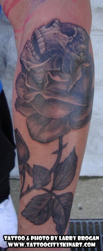 Explore september birth flower tattoo ideas, creative tattoo ideas in Lockport, available at Tattoo City by Larry Brogan