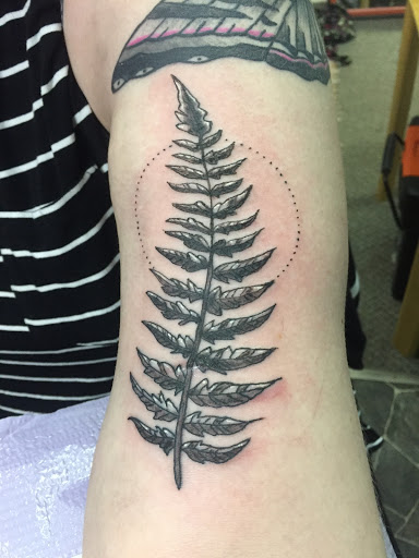 Explore cool leg tattoo ideas for guys, creative tattoo ideas in Calumet, available at Tattooing by Big Ben