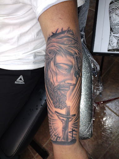 Explore cat and dog tattoo ideas, creative tattoo ideas in Searcy, available at Eternal Art Tattoo Studio lc