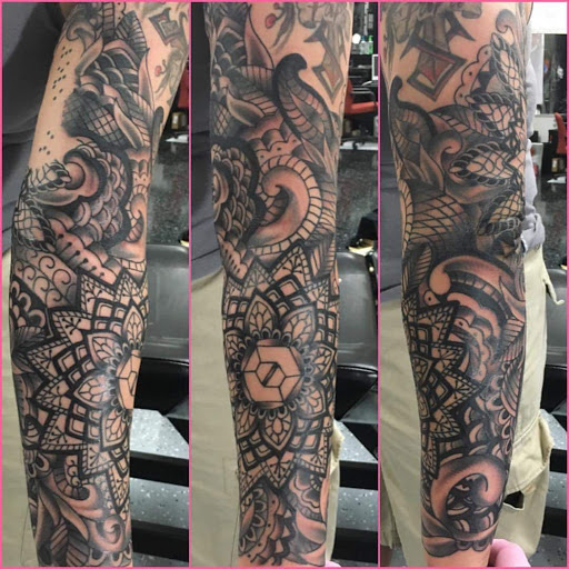 Find poppy tattoo ideas for your next unique tattoo in Fort Worth at HEAVY METAL TATTOO