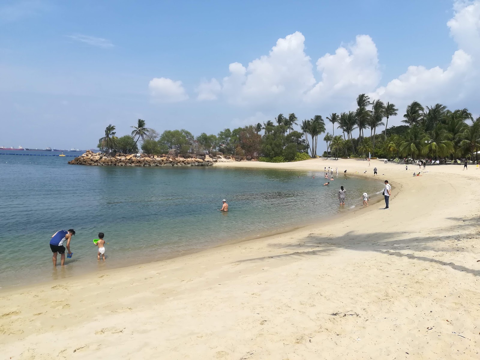 Photo of Sentosa Siloso Beach with turquoise pure water surface