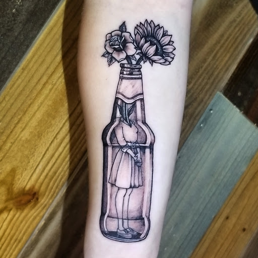 Explore shoe tattoo ideas, creative tattoo ideas in Talbott, available at Alpha Tattoo co.