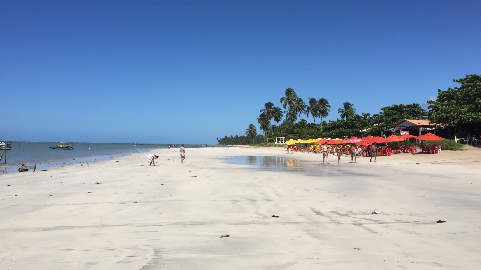 Zdjęcie Praia de Sao Miguel z powierzchnią turkusowa czysta woda