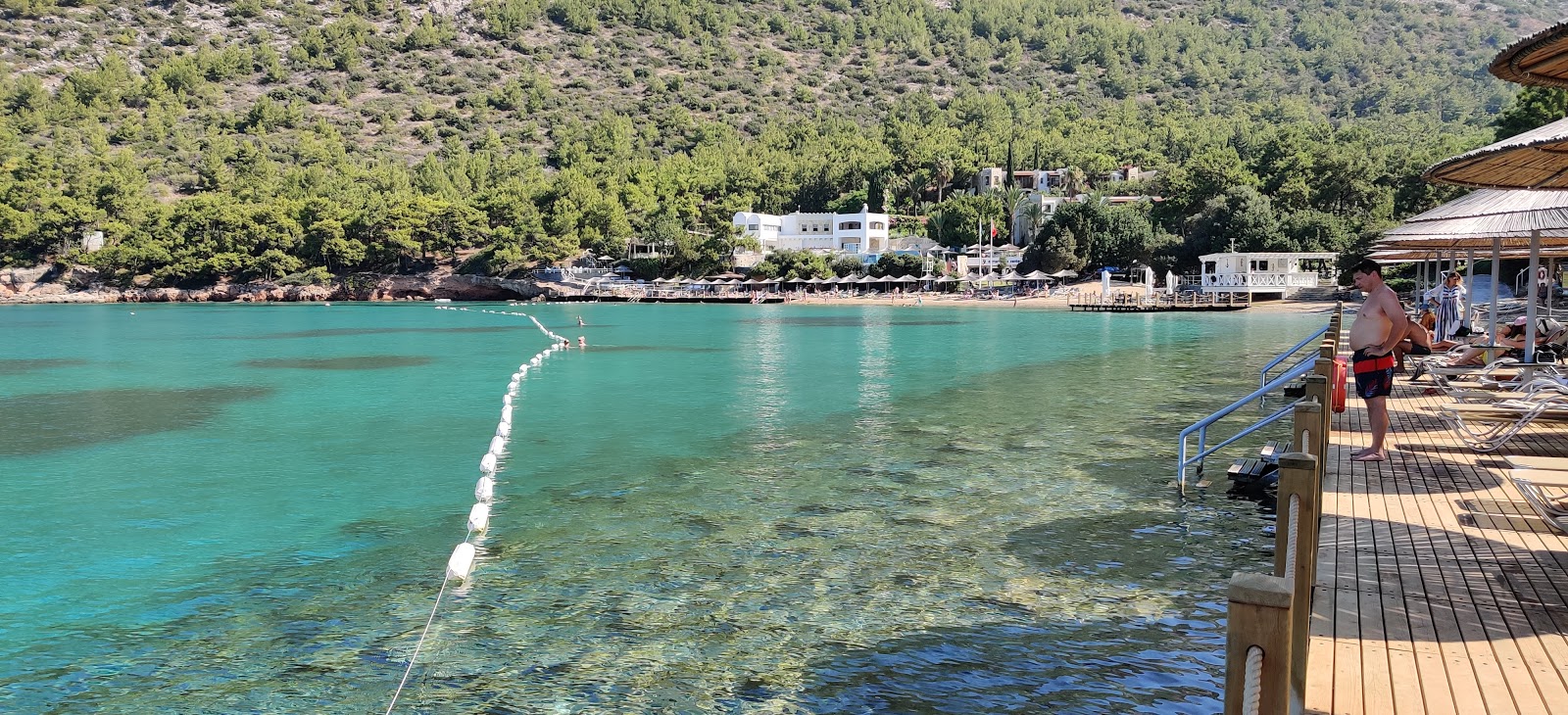 Fotografie cu Plaja Camlik III cu o suprafață de apa pură turcoaz