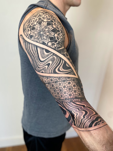 Explore spinal cord tattoo ideas, creative tattoo ideas in Tacoma, available at Tsunami Tattoo