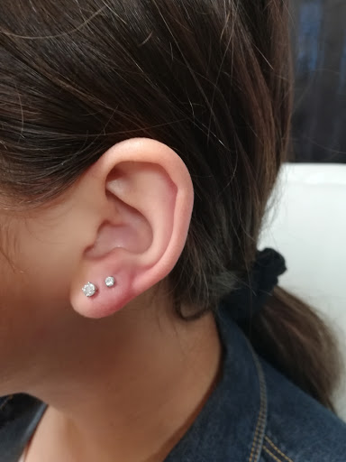 Explore 2 daughters tattoo ideas, creative tattoo ideas in Dripping Springs, available at Hill Country Arts Piercings And Tattoos
