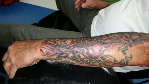 Explore family of 5 tattoo ideas, creative tattoo ideas in Sparks, available at Under Your Skin Tattoo & Body Piercing