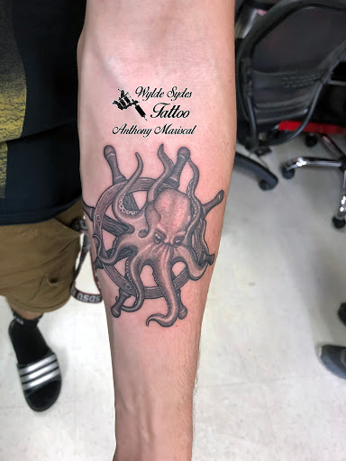 Explore family word tattoo ideas, creative tattoo ideas in San Diego, available at Wylde Sydes Tattoo & Body Piercing