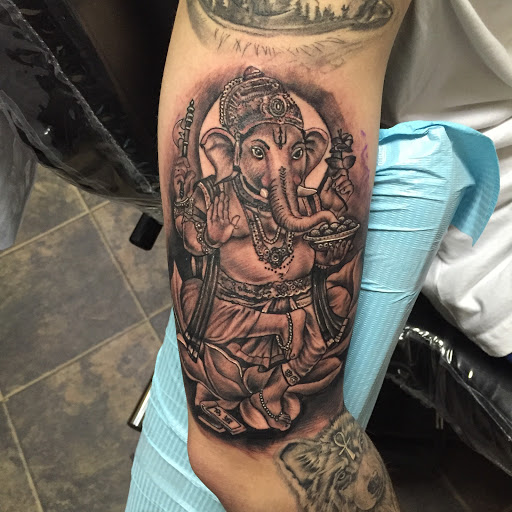 Tattoo Shop «Sterling Tattoo Company», reviews and photos, 721 N State Rd, Davison, MI 48423, USA