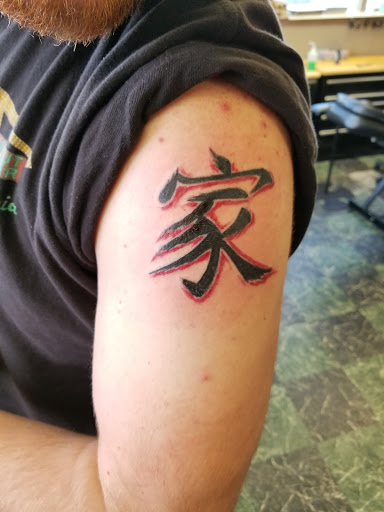 Explore forearm dragon tattoo ideas, creative tattoo ideas in Caldwell, available at Craigs Tattoo Co