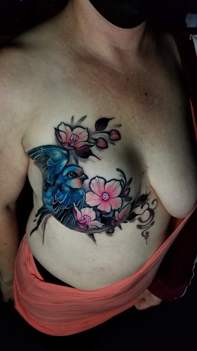 Explore boxing gloves tattoo ideas, creative tattoo ideas in Albuquerque, available at Golden Needle Tattoo Studio