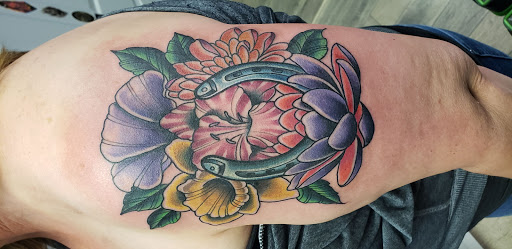 Explore draco tattoo ideas, creative tattoo ideas in Brentwood, available at Eleven Mag Tattoo