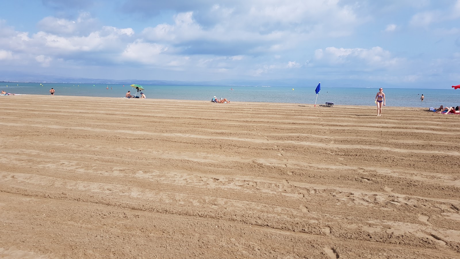 Foto di Spiaggia di Riumar con baia media