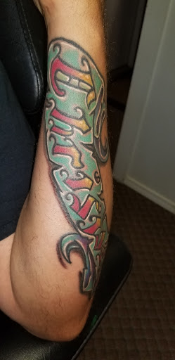 Explore memorial tattoo ideas for grandma, creative tattoo ideas in Angola, available at Hoodlum Ink